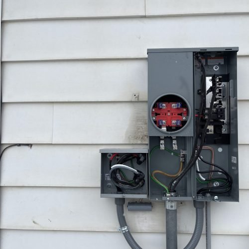 Meter base and service entrance work during an electrical panel upgrade in Ogden, Utah