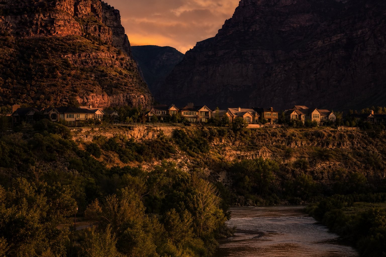 South Weber, Utah homes on the shelf at the mouth of Weber Canyon at dusk